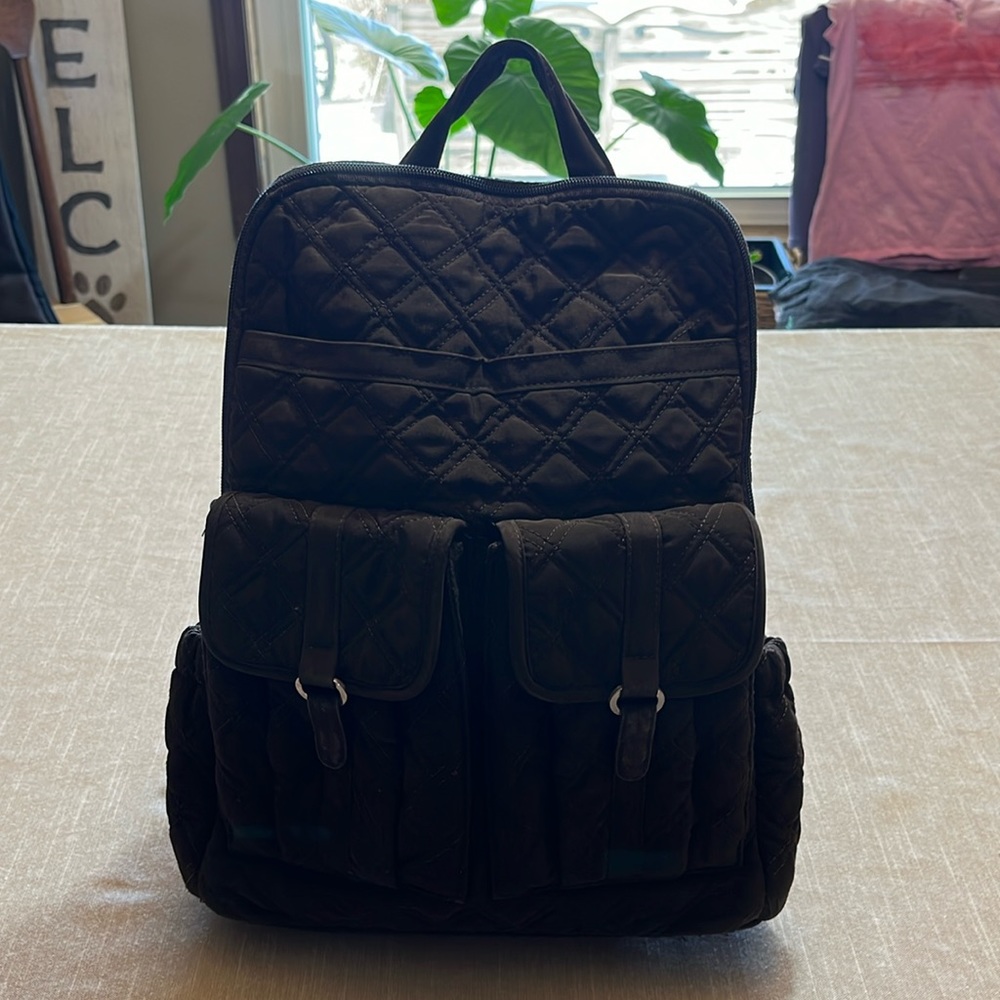 Vera Bradley chocolate brown quilted back pack,4 exterior pockets..